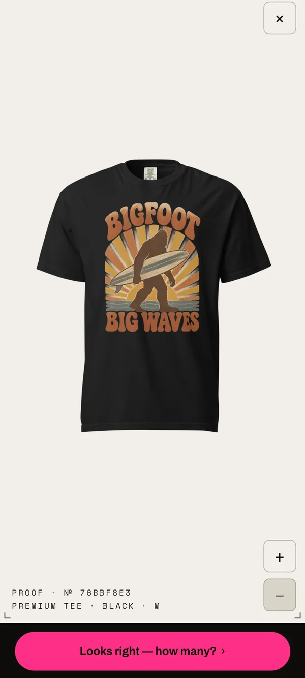 A Bigfoot surf design on a black premium tee.